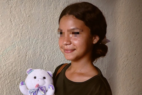 Niña después de haber recibido algo en Yireh